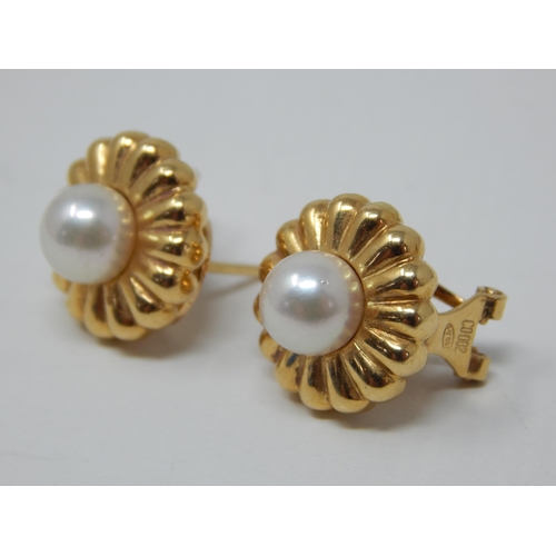 67 - A Pair of 18ct Yellow Gold Earrings Inset with Central Pearls: Gross weight 5.7g
