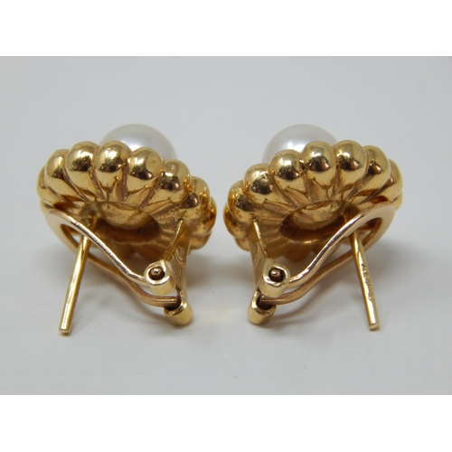 67 - A Pair of 18ct Yellow Gold Earrings Inset with Central Pearls: Gross weight 5.7g