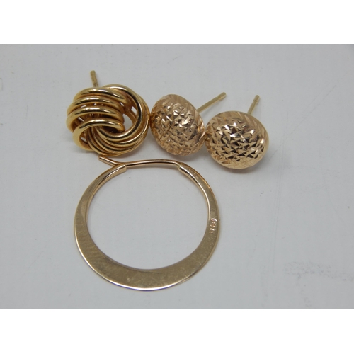 69 - A Pair of 14ct Yellow Gold Earrings together with two odd 14ct Gold earrings: Gross weight 3g