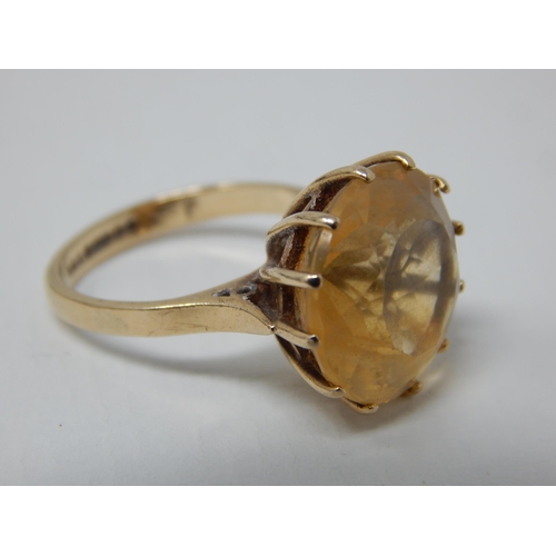 23E - A 9ct Yellow Gold Hallmarked Ring Inset with a Citrine Measuring 6.00cts. Ring Size J