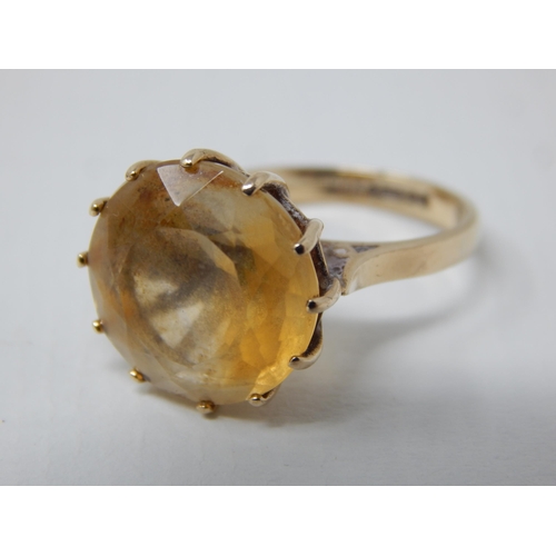 23E - A 9ct Yellow Gold Hallmarked Ring Inset with a Citrine Measuring 6.00cts. Ring Size J