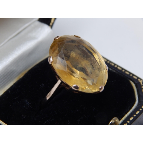 23F - 9ct Yellow Gold Ring Inset with a Topaz Measuring 14.20cts: Ring Size S: In Fitted Harrods Case.