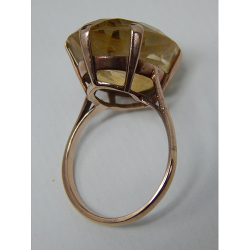 23F - 9ct Yellow Gold Ring Inset with a Topaz Measuring 14.20cts: Ring Size S: In Fitted Harrods Case.