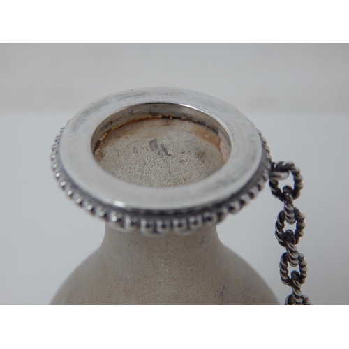 23Q - 19th Century Silver Mounted Rock Crystal Perfume Flask. The Silver Top Chained. Measuring 7.2cm high