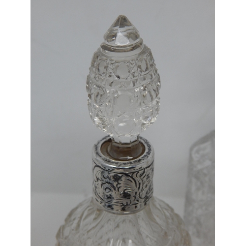 23S - Silver Mounted Cut Glass Perfume Bottle & Stopper together with two further Cut Glass Perfume Bottle... 