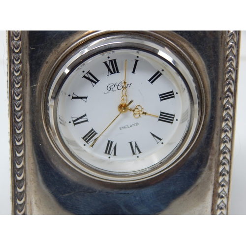 24K - Two Silver Fronted Easel Backed Desk Clocks: Hallmarked Sheffield 1994/1995 by Richard Carr