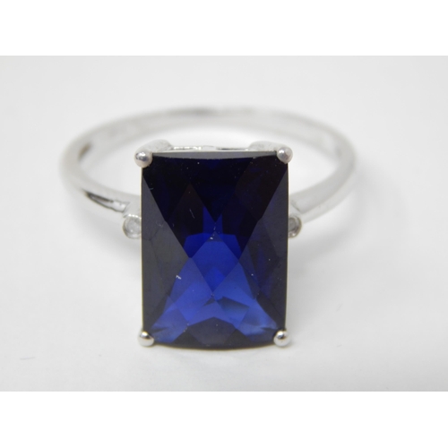 24L - 9ct White Gold Ring Set with a Diamond Either Side of a Large Faceted Blue Gem Stone in Fitted Case.... 