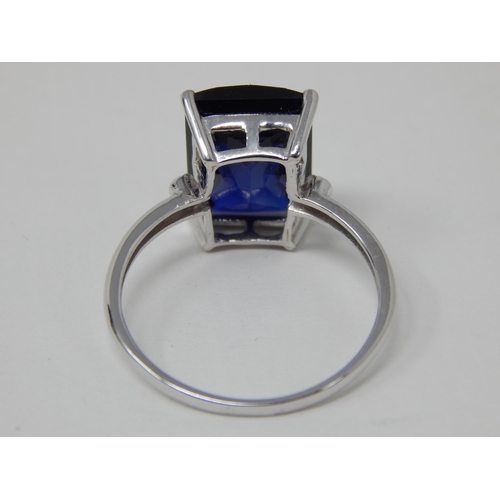 24L - 9ct White Gold Ring Set with a Diamond Either Side of a Large Faceted Blue Gem Stone in Fitted Case.... 