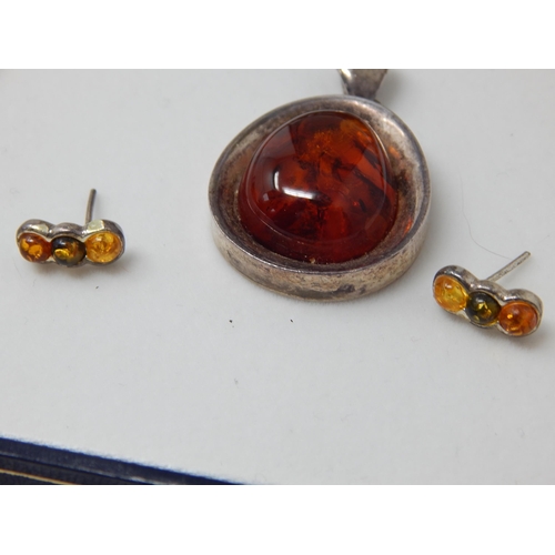 357 - Suite of Amber Set Jewellery Mounted in Silver: Comprising Bracelet, Brooch, Pendant & Earrings.