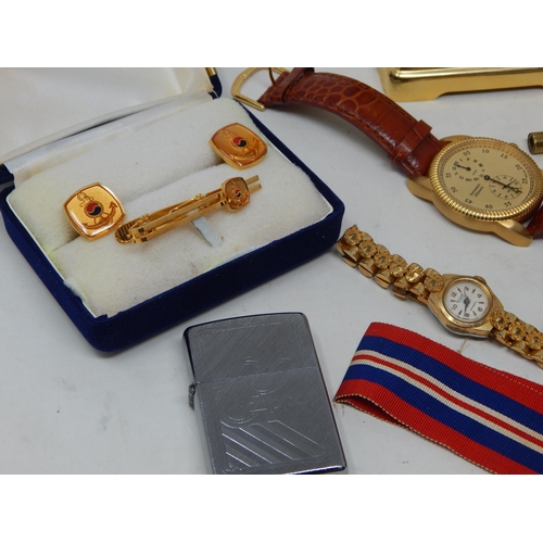 40 - A Carriage clock and key, various wristwatches, costume jewellery, etc