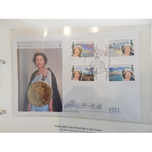 90 - The Royal Family Coin Covers and Stamp Sets in blue album twinned with a huge selection of other sta... 