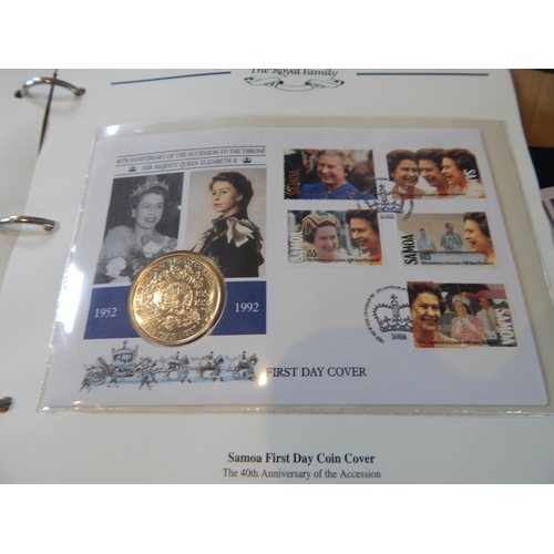 90 - The Royal Family Coin Covers and Stamp Sets in blue album twinned with a huge selection of other sta... 