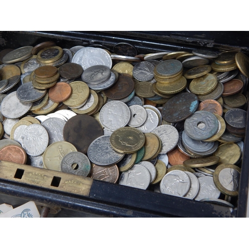 76 - Vintage tin containing a large selection of coins and world banknotes