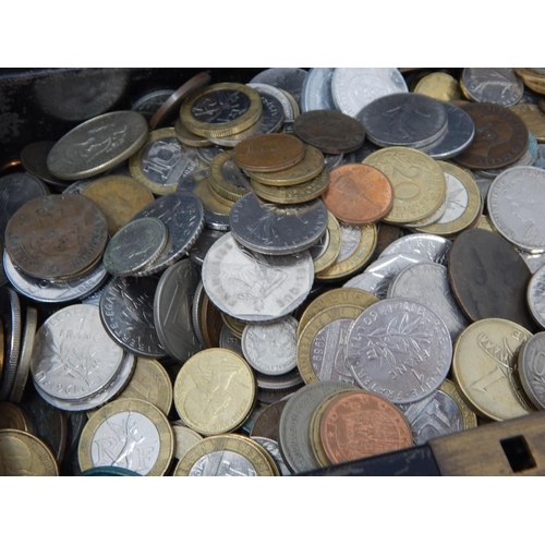 76 - Vintage tin containing a large selection of coins and world banknotes