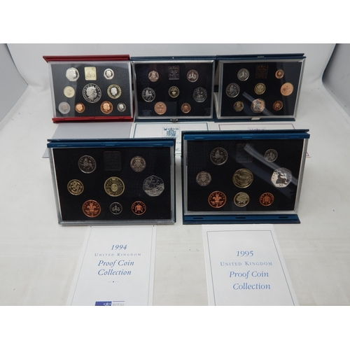 94 - UK Proof Sets 1986, 1987, 1990, 1991, 1995 all about as struck and housed in blue Royal Mint cases o... 