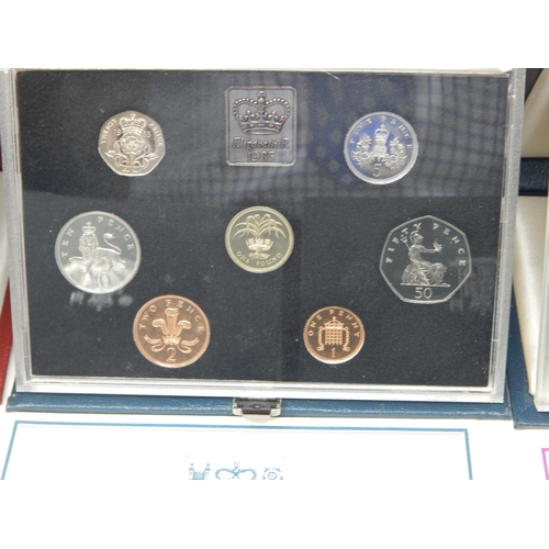 94 - UK Proof Sets 1986, 1987, 1990, 1991, 1995 all about as struck and housed in blue Royal Mint cases o... 