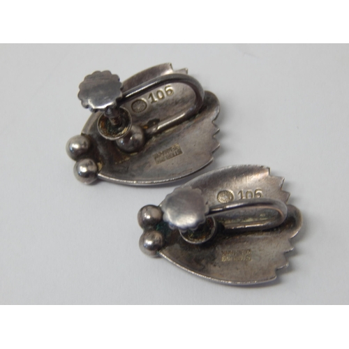 365 - A Pair of Georg Jensen Silver Screw Back Earrings: Marked Georg Jensen 106 Sterling Denmark.