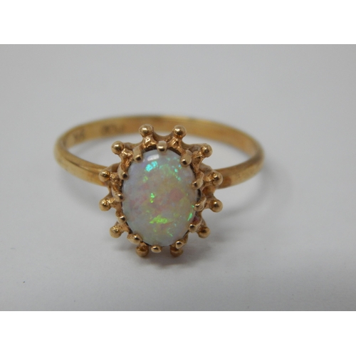 380 - 9ct Yellow Gold Ring Set with a Central Opal: Ring Size L/M