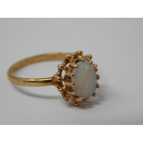 380 - 9ct Yellow Gold Ring Set with a Central Opal: Ring Size L/M