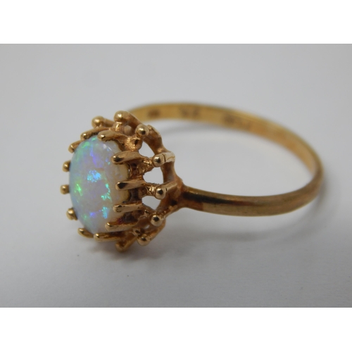 380 - 9ct Yellow Gold Ring Set with a Central Opal: Ring Size L/M