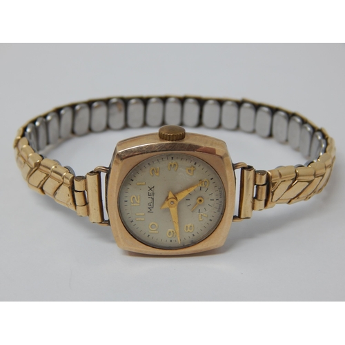 388 - 9ct Yellow Gold Ladies Majex Wristwatch on expandable plated bracelet.