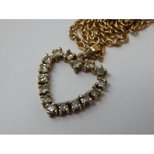 392 - 9ct Yellow Gold Diamond Set Heart Pendant on 9ct Gold Chain. Weight 4.4g