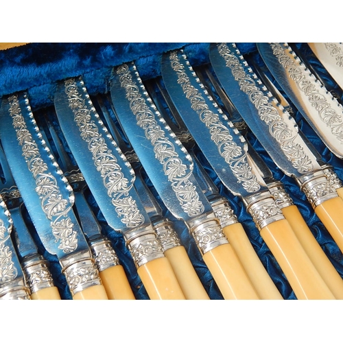 395 - Victorian Canteen of Ivory Handled Silver plated Cutlery for 12 Place Settings: Presented in Origina... 