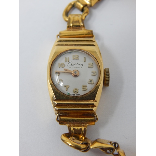 402 - 18ct Yellow Gold Ladies Wristwatch on Rolled Gold Strap.