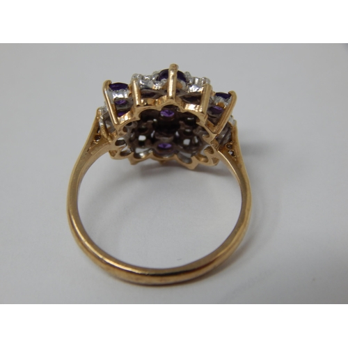 439 - 9ct Yellow Gold Amethyst & Diamond Four Tier Cluster Ring: Size K/L