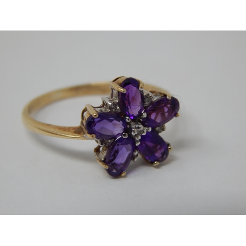 440 - 9ct Yellow Gold Amethyst & Diamond Flower Head Ring: Size K/L