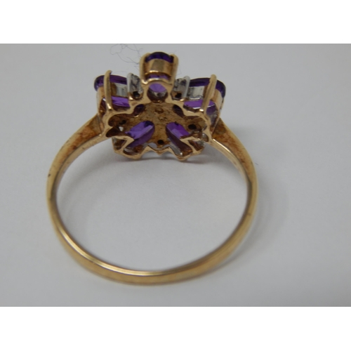 440 - 9ct Yellow Gold Amethyst & Diamond Flower Head Ring: Size K/L