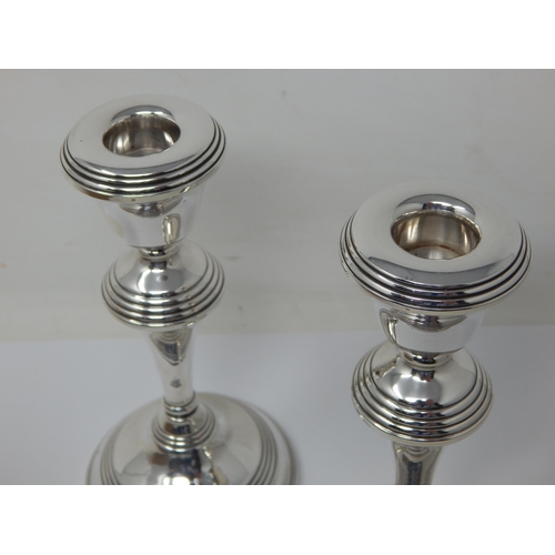 443 - A Pair of Silver Candlesticks Measuring 7.5