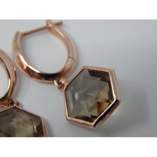 453 - A pair of Silver with Rose Gold Overlay Smoky Quartz Earrings: Approx 6.30cts