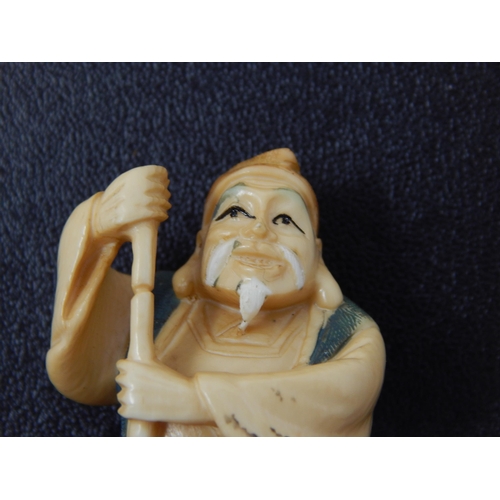 652 - Signed Late C19th/Early C20th Japanese polychrome inked Ivory Netsuke in the form of an Elder with F... 