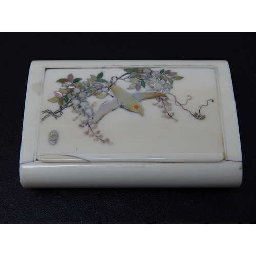 655 - Japanese Hinge Lidded Ivory Box with Shibayama Decoration of a Bird in Flight. Measures 10cm x 7cm x... 