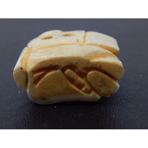 657 - Late C19th/Early C20th Japanese Netsuke of Seated gentlemen holding gourd/fruit 3cm x 3xm x 1cm