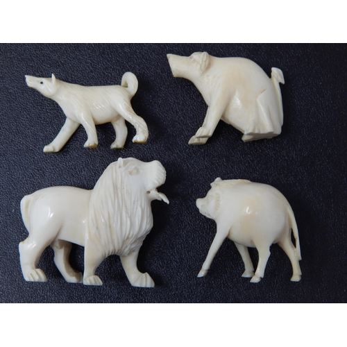 667 - 4 x Well Carved Late C19th/Early C20th Ivory miniature Animals including pig, monkey, lion, wolf. Li... 