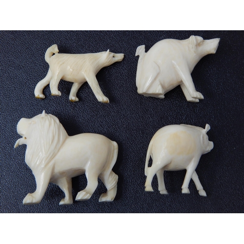 667 - 4 x Well Carved Late C19th/Early C20th Ivory miniature Animals including pig, monkey, lion, wolf. Li... 