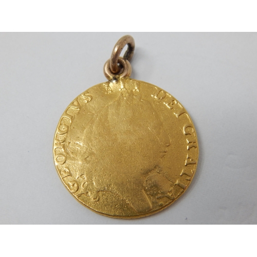 207 - George III Gold Guinea 1794 with attached loop. Gross weight 8.7g