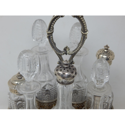 311 - Victorian Silver Plated Cruet Stand Containing 8 Bottles, 3 with Silver Tops Hallmarked Sheffield by... 