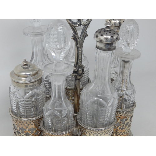 311 - Victorian Silver Plated Cruet Stand Containing 8 Bottles, 3 with Silver Tops Hallmarked Sheffield by... 