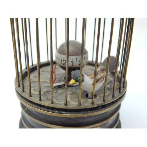 601 - Automaton Bird in Brass Cage Bottom Wind Clock: Measuring 15cm high. Working When Catalogued