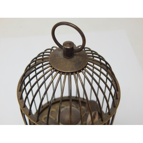 601 - Automaton Bird in Brass Cage Bottom Wind Clock: Measuring 15cm high. Working When Catalogued