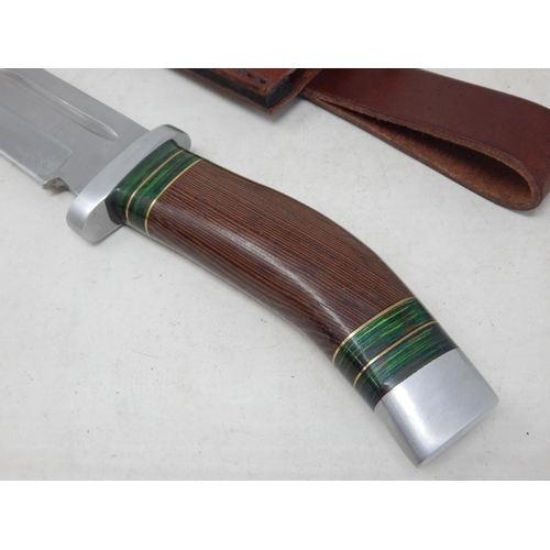 515 - Bowie Knife with Wooden Grip in Leather Scabbard Measuring 33.5cm