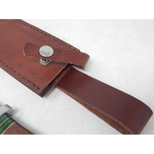 515 - Bowie Knife with Wooden Grip in Leather Scabbard Measuring 33.5cm