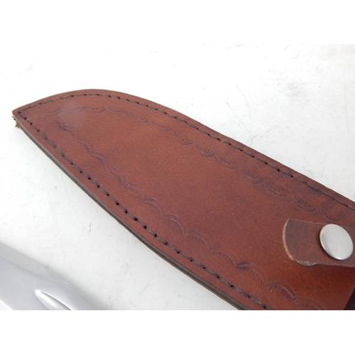 515 - Bowie Knife with Wooden Grip in Leather Scabbard Measuring 33.5cm