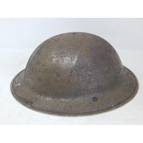 523 - WWII British Tommy Helmet with Inner Chin Strap