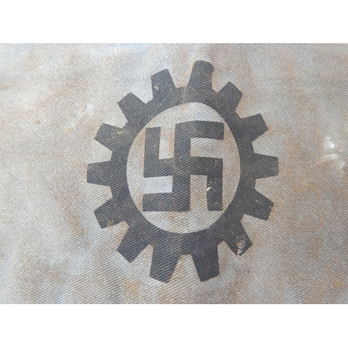 530 - WWII Nazi Germany Armband with Swastika within a Cogwheel.