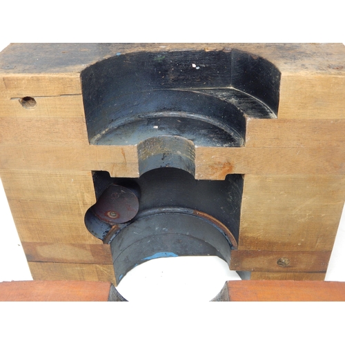 554 - A pair of Wooden Tank Shell Moulds together with a copy of 