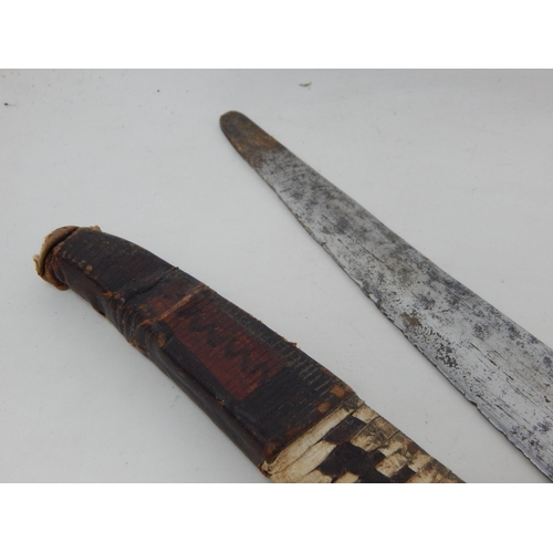 557 - Cast Sword with Leather Scabbard 66cm together with a Dagger & Scabbard 28cm